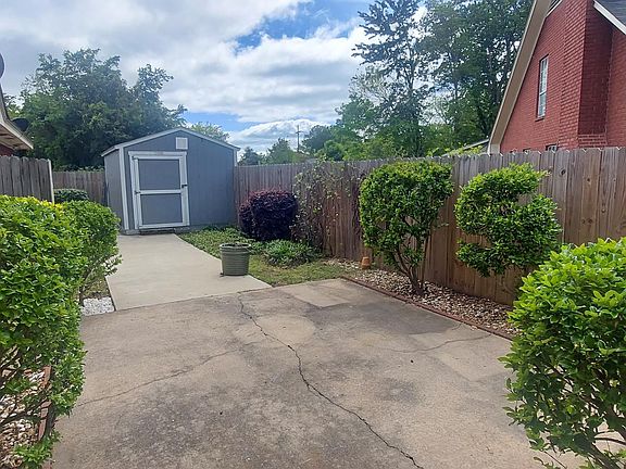 Enclosed patio has room for outdoor furniture & grill.
