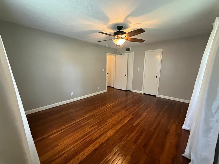 Second Bedroom with large closet-- the two closet doors access one large storage closet.