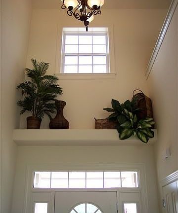 Foyer with dramatic volume ceilings