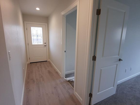 hallway to bedrooms and backyard