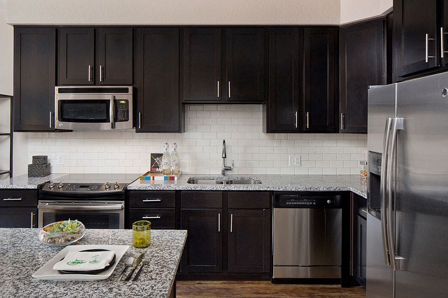 Stainless steel appliances and granite countertops