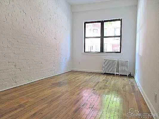 1st image of 419 W 56th St APT 1A
