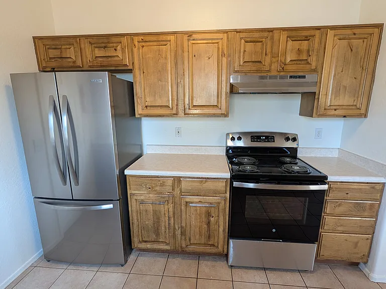 Freshly updated with a brand-new refrigerator and stainless steel range.