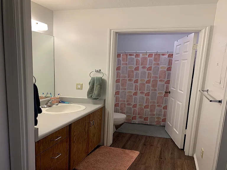 Experience modern comfort in this beautifully designed bathroom space.