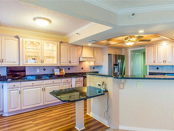 5th image of 5950 Pelican Bay Plz S APT 1101