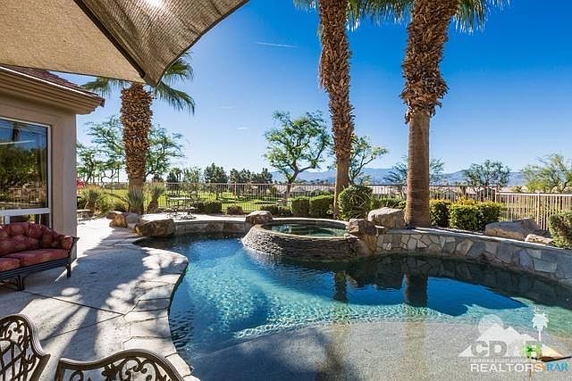 Pool area. Large hot tub