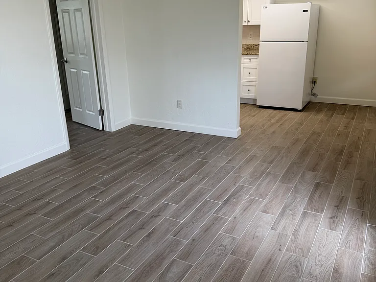 Living room looking into kitchen