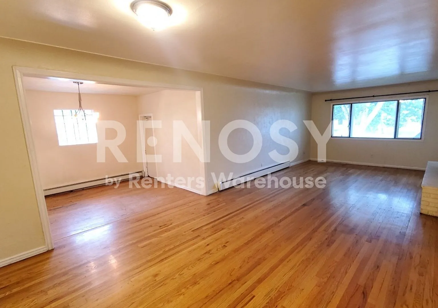 Don't miss this gorgeous 5 Bed 2 Bath home in University Hills — Photo 3