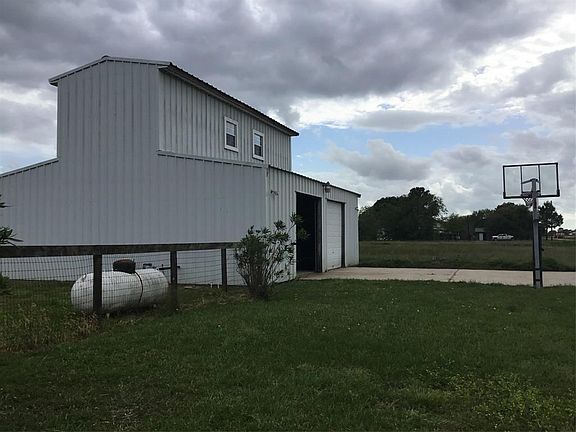 Barn with 2 totally finished large offices -- one up and one down and tons of storage for RV, boat, etc.