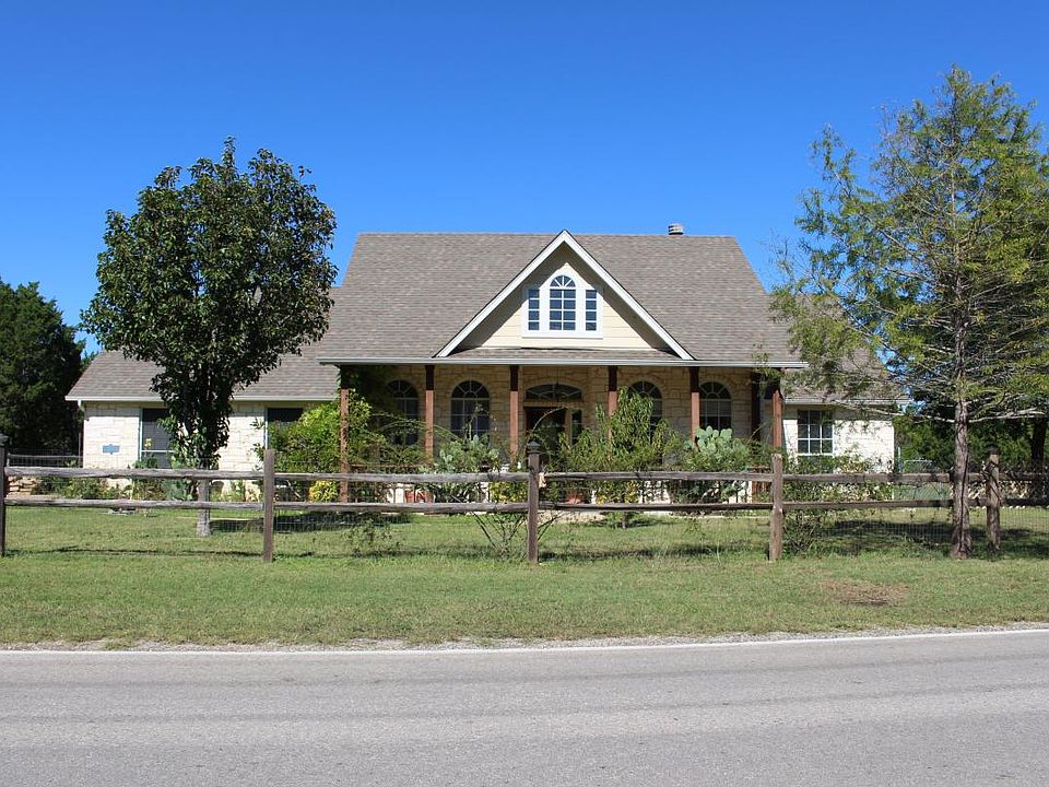 Front view from the street with fully fenced front yard