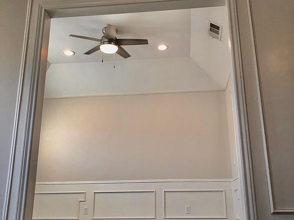 Dining room leading to kitchen & living room area