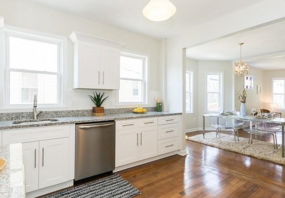 Open layout from kitchen to dining to living