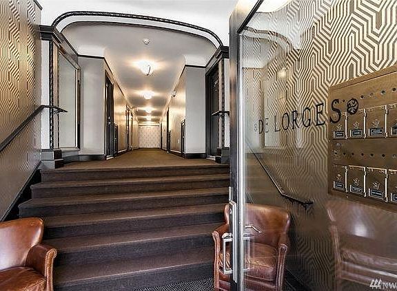 Building Entryway with original finishes including post boxe