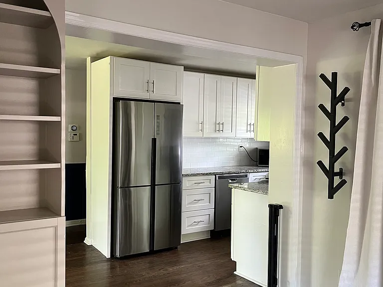Kitchen view from mixed-use room