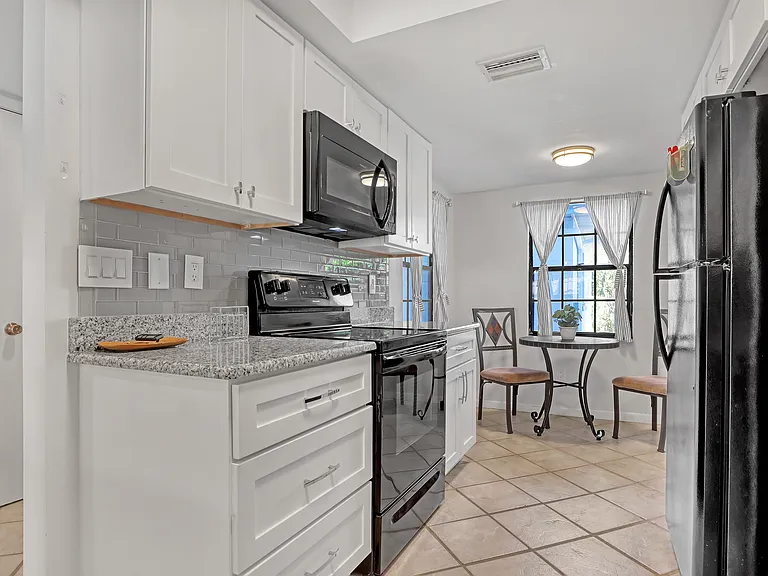 Kitchen and eat in dining table