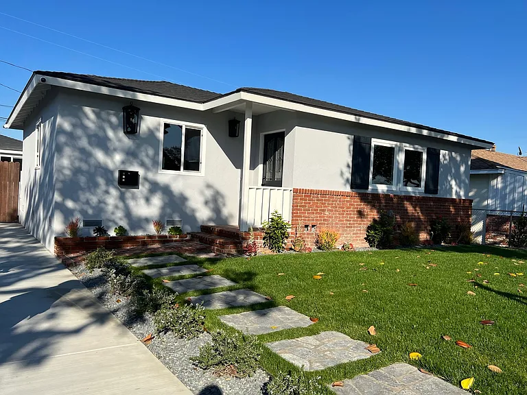 Front Exterior: Beautifully landscaped yard