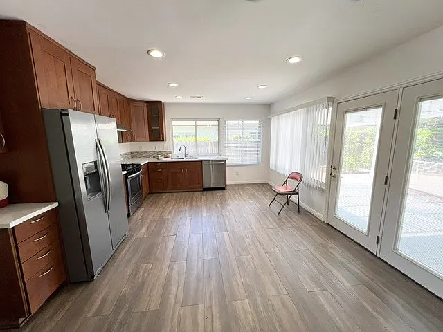 Kitchen&Dining room (after and picture #2) - (repainted and replaced with new tiles in flooring design)