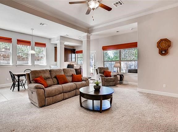 View to breakfast area and desk area from family room