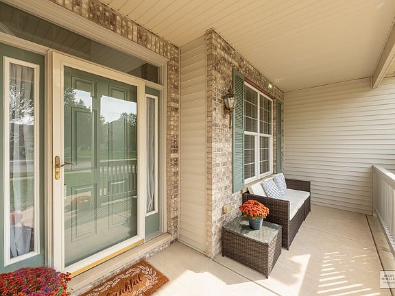 Adorable front porch! This is a great place to start your day with a warm cup of coffee and