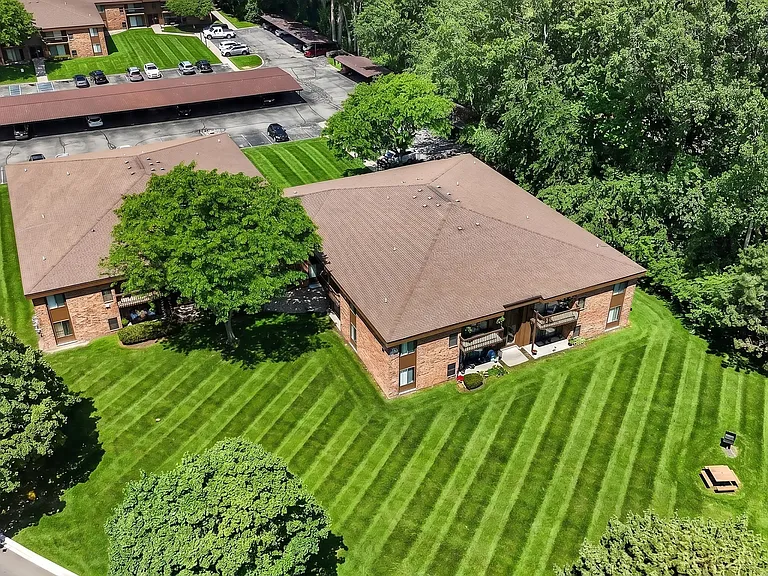 Lush green yard at Eastwood Village Apartments in Clinton Township, MI.