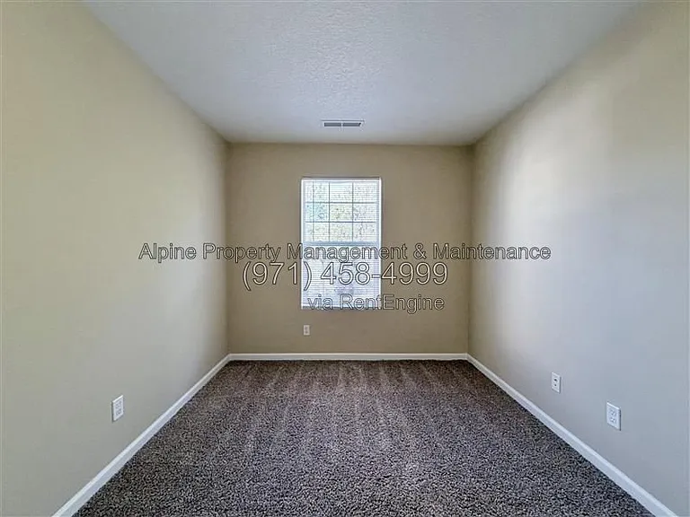 5758 NE Damsel Dr — Photo 21