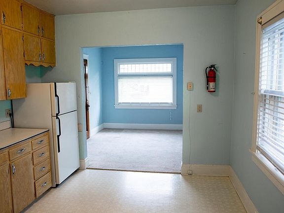 Kitchen looking into living room/entry