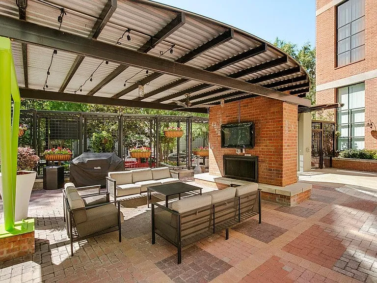 TV and Fireplace in Courtyard