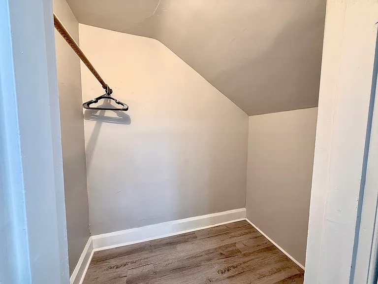 The master bedroom's walk-in closet offers plenty of space for all your belongings, providing a convenient and organized storage solution.