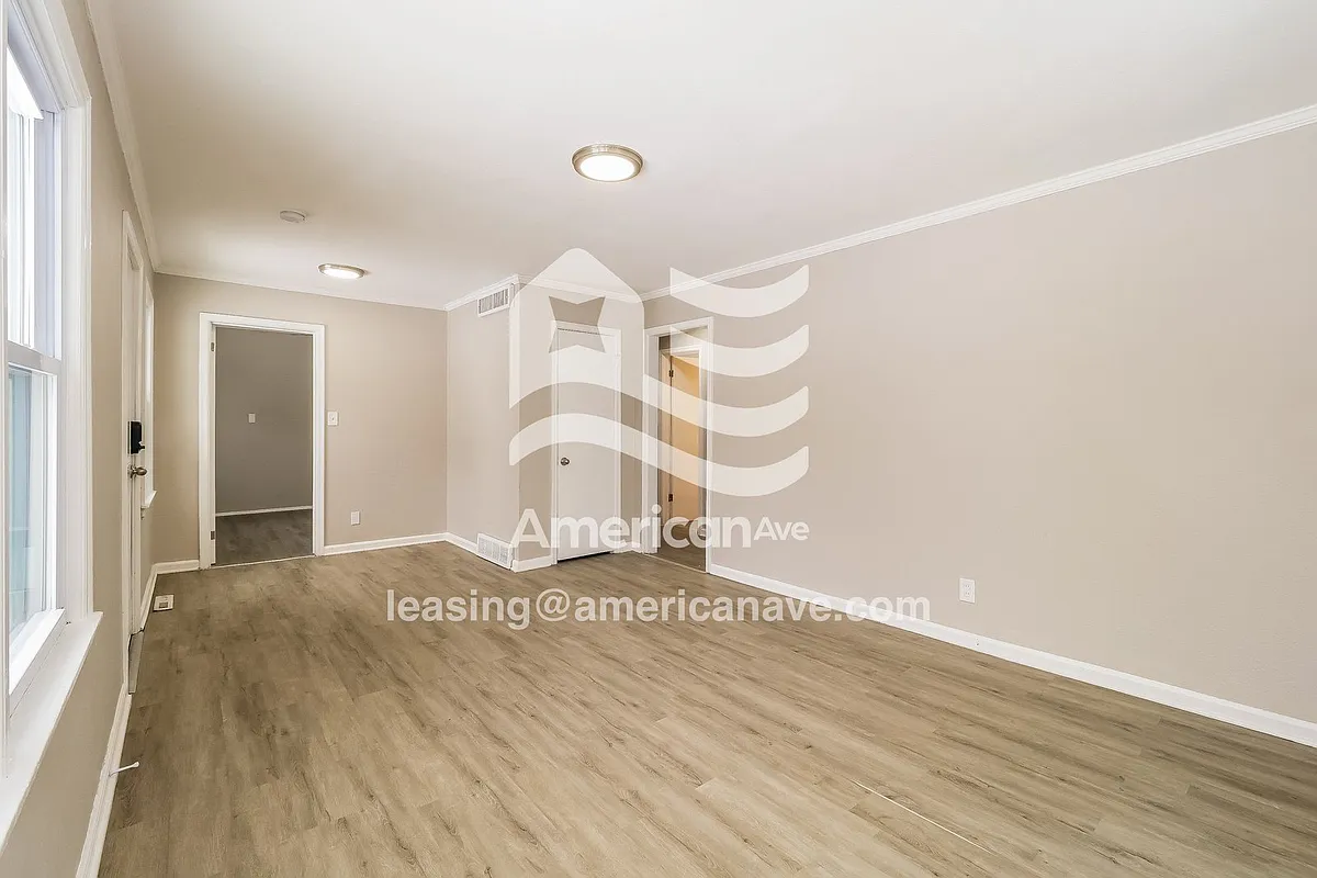 1036663_002_wm_-_living_room_13513122.jpg - 8317 Olive St