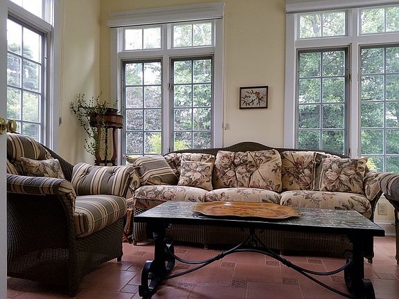 Sunroom : Private view of wooded backyard.