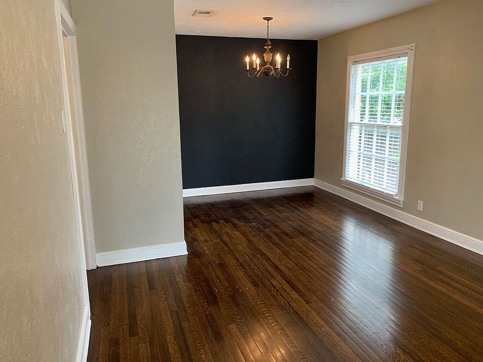 The dining area is directly adjacent to the remodeled kitchen.