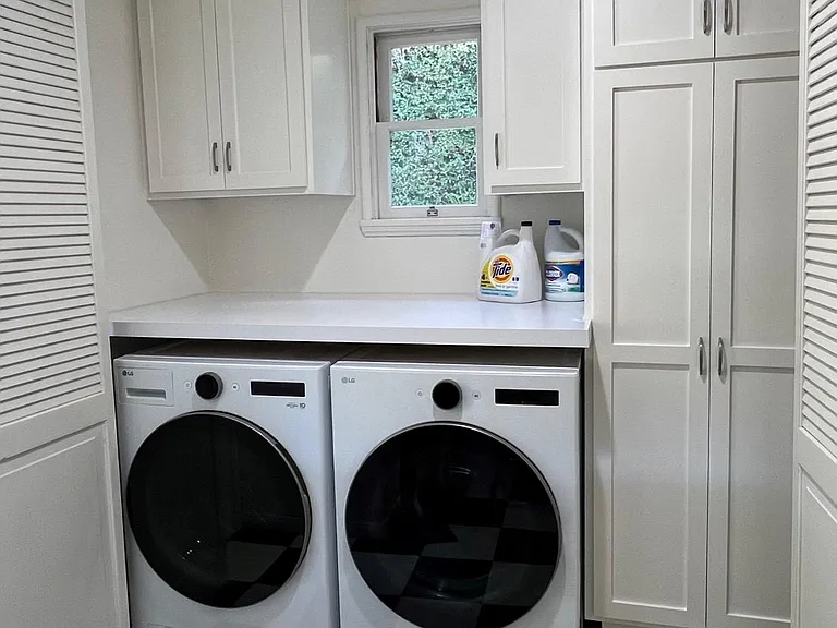 Newly remodeled laundry room off kitchen