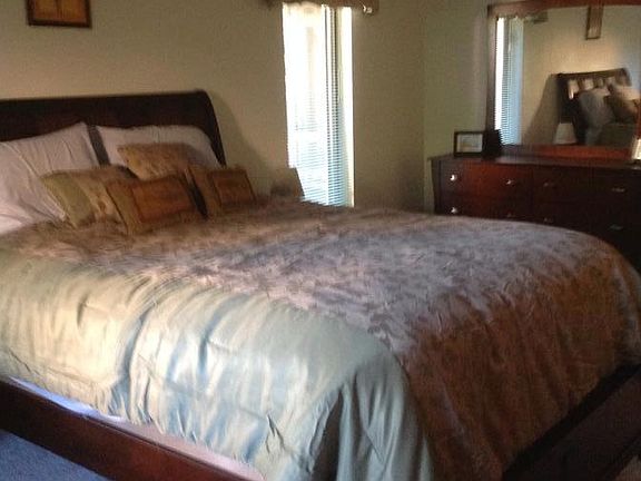 Queen size bed, dresser, chest, cable tv, desk.