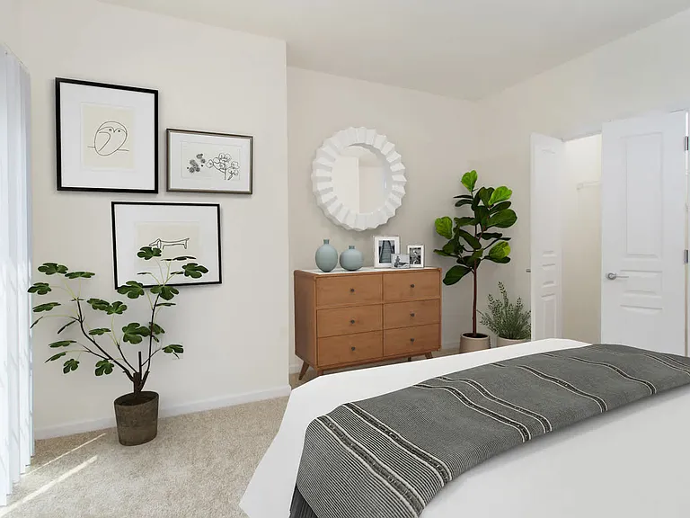 Carpeted Bedroom with Walk-In Closet
