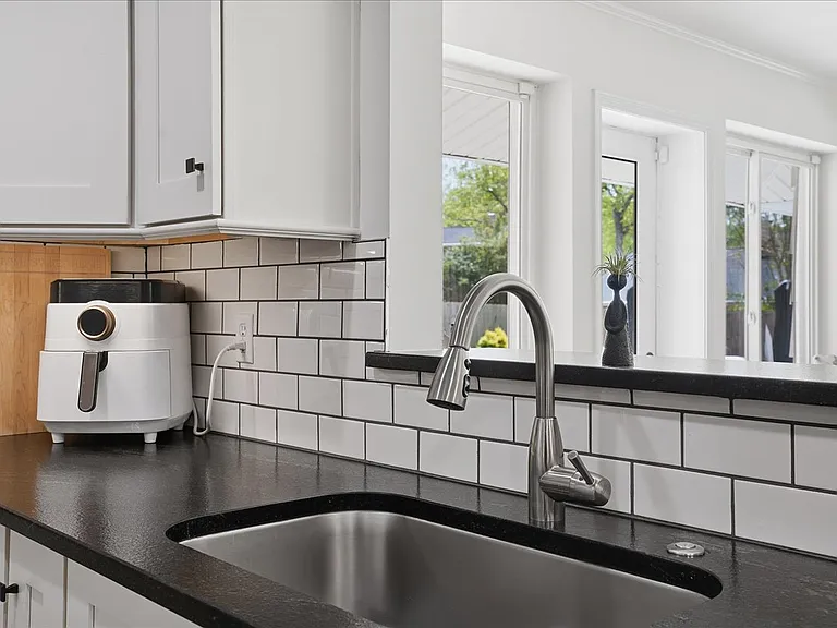All stainless steel kitchen appliances are included.