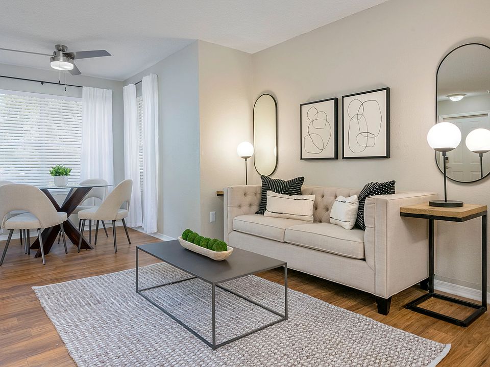 Bright and airy living room with a versatile bonus space, inviting you to create a cozy oasis for your hobbies, passions, or relaxation.