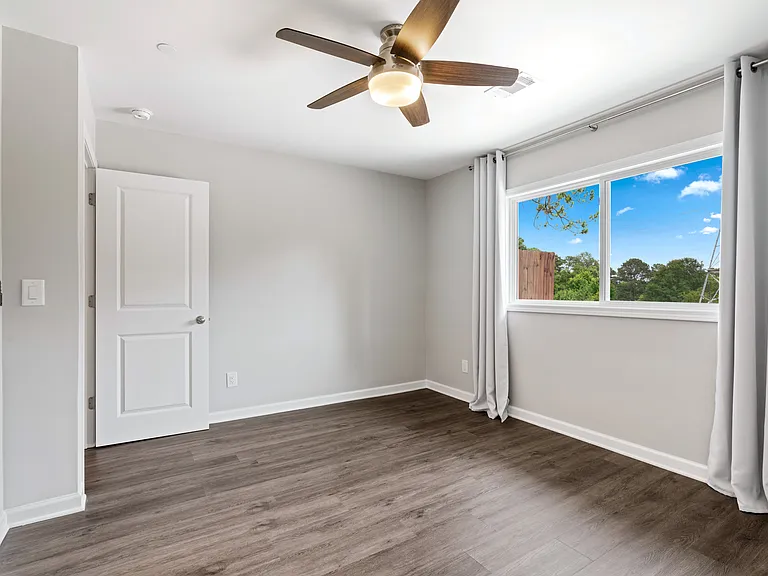 Spacious primary bedroom with two generous closets.