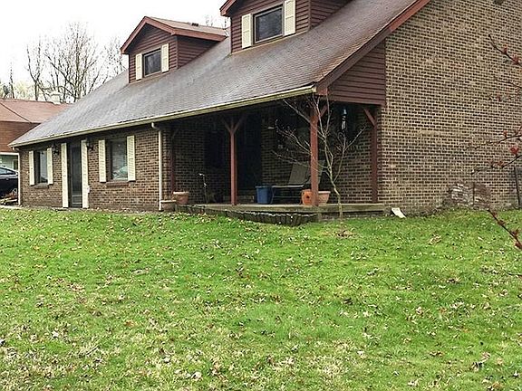 A better view of the back, side, and upper additions.