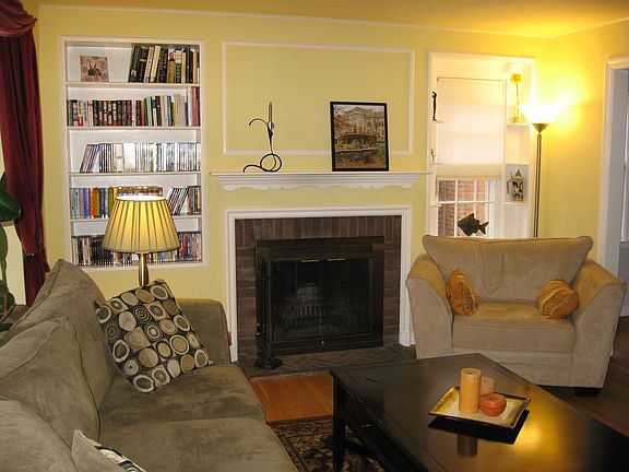 Elegant woodburning fireplace (could be converted to gas) featuring gleaming h