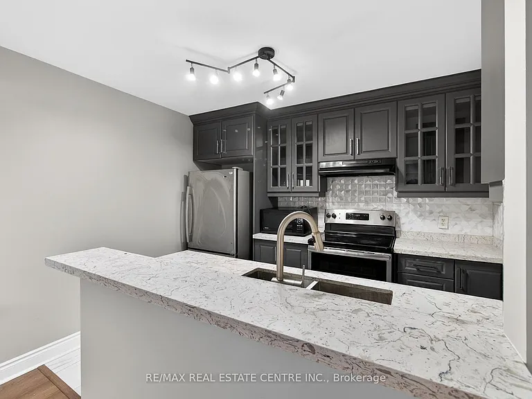 5035 Oscar Peterson Blvd #105 — Photo 12