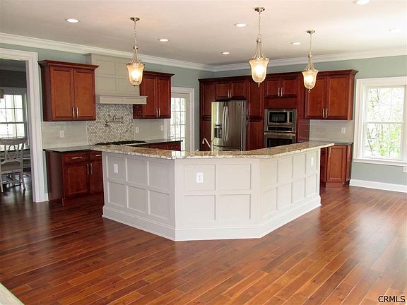 Spacious, open kitchen with ample space to work and entertain.  Bi-level island.