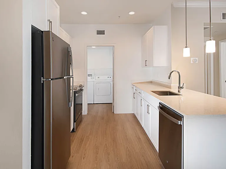 Kitchen with Quartz Countertops and Stainless Steel Appliances