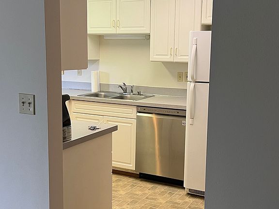 Kitchen with Oven, Stove top, Dishwasher.