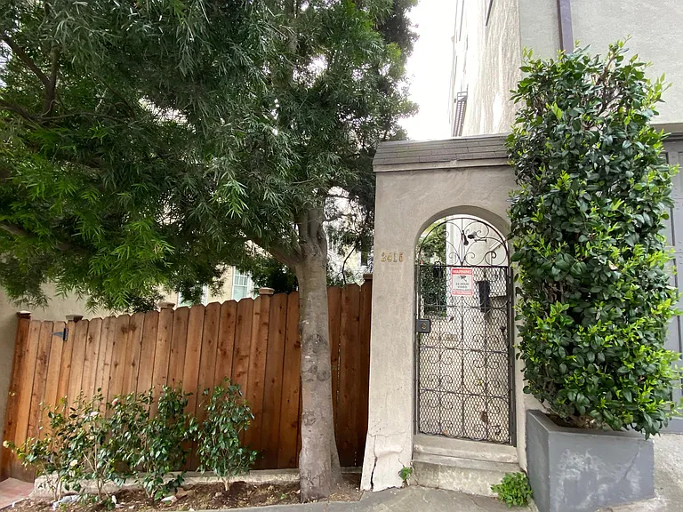 Private street entrance to quiet garden unit in the back of the building.
