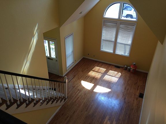 Living room with vaulted ceiling