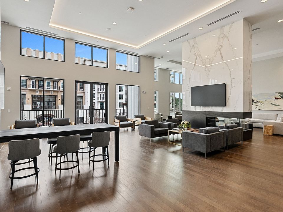Spacious resident lounge with white marble countertops