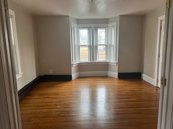 Spacious bedroom (or den) off the living room with full closet and French doors
