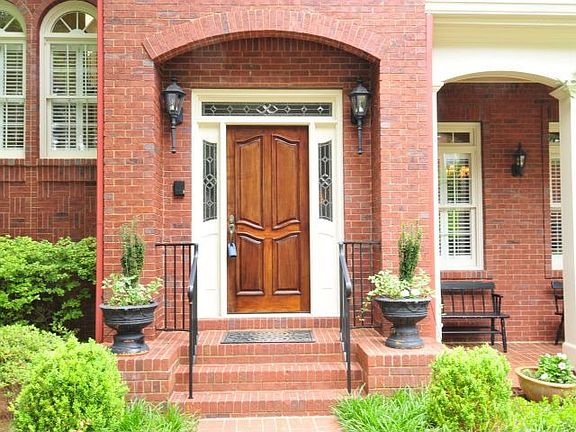 Brick covered arch welcomes guest