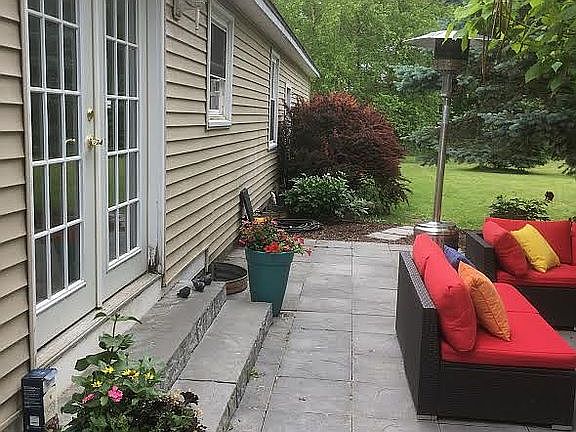 French doors to stone patio