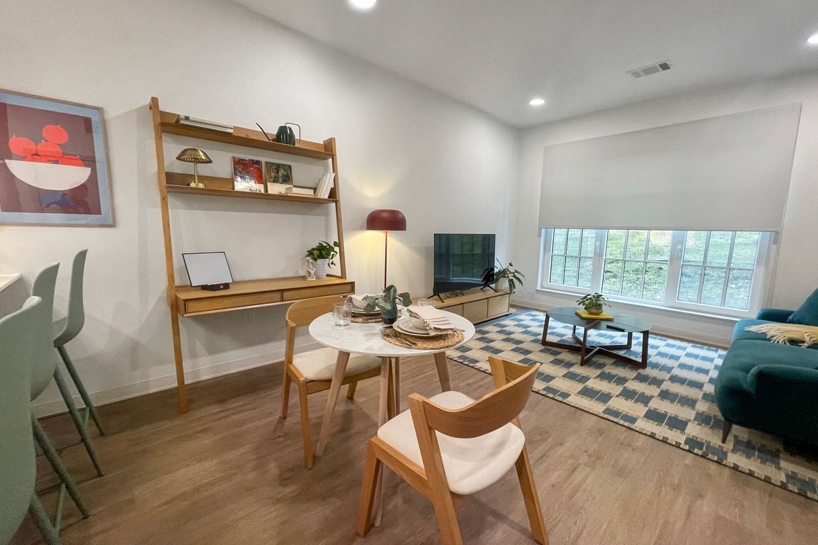 Dining and Living Room - 1 Bedroom Model Home